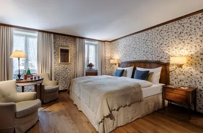 Ein Bett oder Betten in einem Zimmer der Unterkunft Monte Rosa Boutique Hotel