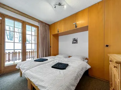 Ein Bett oder Betten in einem Zimmer der Unterkunft Les Mayens de l'Ours - At the foot of Piste de l'Ours' slope!