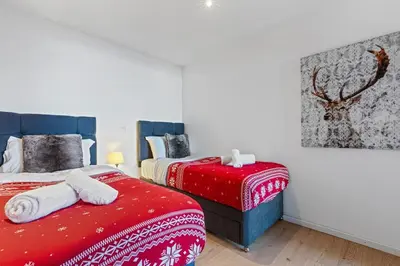 Ein Bett oder Betten in einem Zimmer der Unterkunft Chalet Marmotte, à seulement 50m de la piste