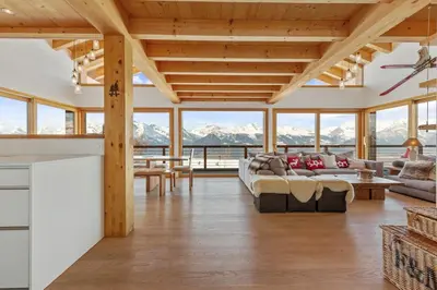 Ein Sitzbereich in der Unterkunft Chalet Marmotte, à seulement 50m de la piste
