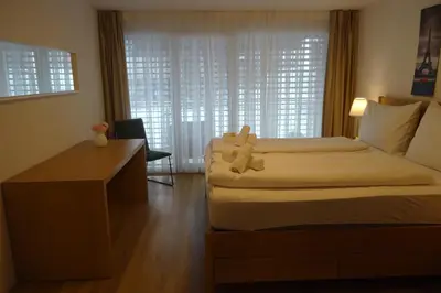 Ein Bett oder Betten in einem Zimmer der Unterkunft The Golf apartments