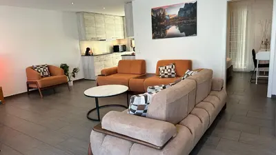 Ein Sitzbereich in der Unterkunft The Golf apartments