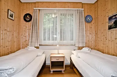 Ein Bett oder Betten in einem Zimmer der Unterkunft Apartment Schönegg - GRIWA RENT AG