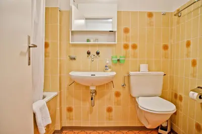 Ein Badezimmer in der Unterkunft Apartment Schönegg - GRIWA RENT AG