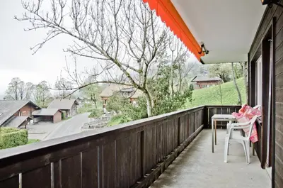 Ein Balkon oder eine Terrasse in der Unterkunft Apartment Schönegg - GRIWA RENT AG