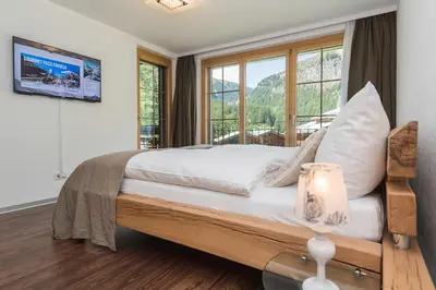Ein Bett oder Betten in einem Zimmer der Unterkunft Chalet Monte Cristo