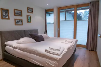 Ein Bett oder Betten in einem Zimmer der Unterkunft Meric Apartment