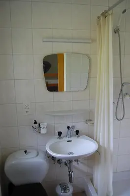 Ein Badezimmer in der Unterkunft CRANS MONTANA LE REGENT APPARTEMENT