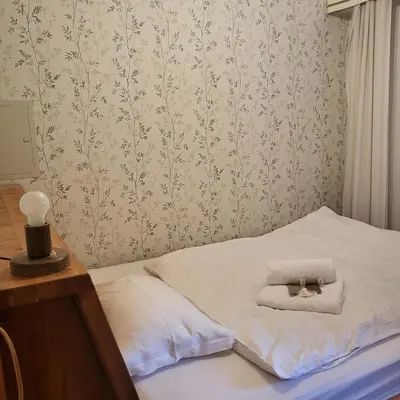 Ein Bett oder Betten in einem Zimmer der Unterkunft CRANS MONTANA LE REGENT APPARTEMENT