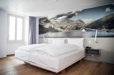 Ein Bett oder Betten in einem Zimmer der Unterkunft Hotel & Restaurant Forni