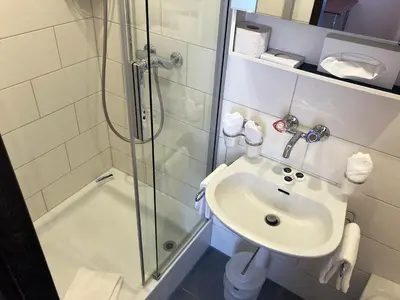 Ein Badezimmer in der Unterkunft Post Hardermannli