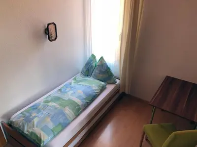 Ein Bett oder Betten in einem Zimmer der Unterkunft Post Hardermannli