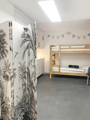 Ein Bett oder Betten in einem Zimmer der Unterkunft Plein Coeur de la Vieille Ville de Sion