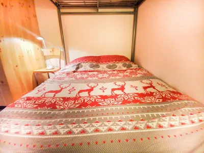 Ein Bett oder Betten in einem Zimmer der Unterkunft Appartement à Crans-Montana - avec magnifique vue sur la vallée