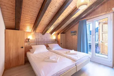 Ein Bett oder Betten in einem Zimmer der Unterkunft Greppons O 040 - MOUNTAIN apartment 8 pers