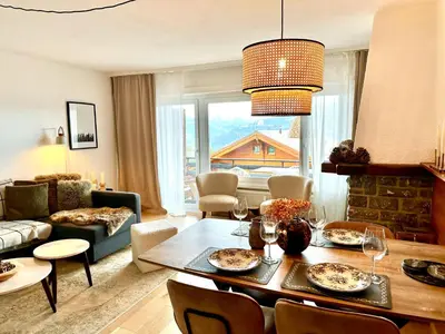 Ein Sitzbereich in der Unterkunft Window on Crans Montana, Appartement avec vue sur les Alpes