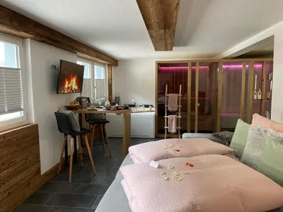 Ein Bett oder Betten in einem Zimmer der Unterkunft Mountainsuite