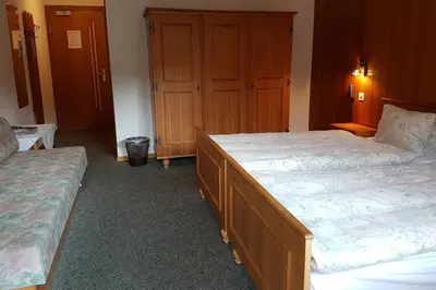 Ein Bett oder Betten in einem Zimmer der Unterkunft Hotel Restaurant Krone