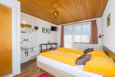 Ein Bett oder Betten in einem Zimmer der Unterkunft Hotel Park