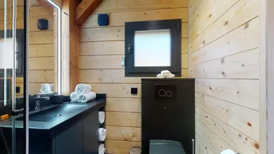 Ein Badezimmer in der Unterkunft Woodland Village Anzère