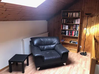 Ein Sitzbereich in der Unterkunft Auberge Les Rangs