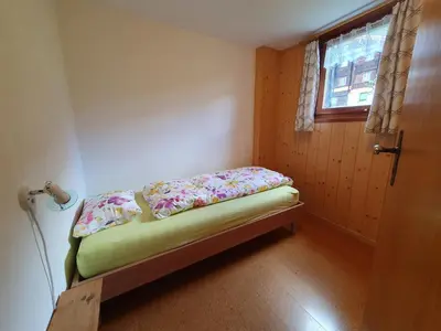 Ein Bett oder Betten in einem Zimmer der Unterkunft Gadä 2