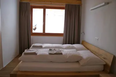 Ein Bett oder Betten in einem Zimmer der Unterkunft Perle des Alpes, Bettmeralp, Switzerland
