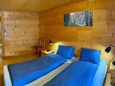 Ein Bett oder Betten in einem Zimmer der Unterkunft Apartment Chalet Jungtalblick Eggeri by Interhome