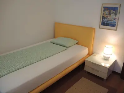 Ein Bett oder Betten in einem Zimmer der Unterkunft Casa Gialla by Fewotessin