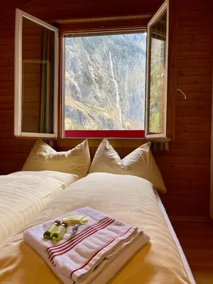 Ein Bett oder Betten in einem Zimmer der Unterkunft Alpine Base Hostel - Adults only