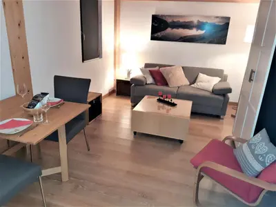 Ein Sitzbereich in der Unterkunft Anniviers : studio avec mezzanine