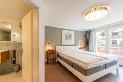 Ein Bett oder Betten in einem Zimmer der Unterkunft Balmas Paradies-perfect family home