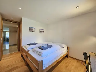 Ein Bett oder Betten in einem Zimmer der Unterkunft Aramis Lodge