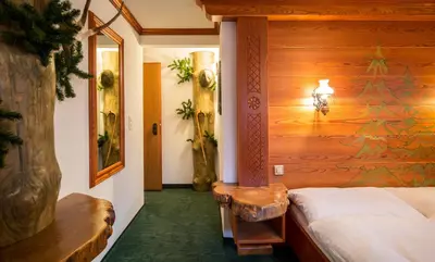 Ein Bett oder Betten in einem Zimmer der Unterkunft Hotel Olympia