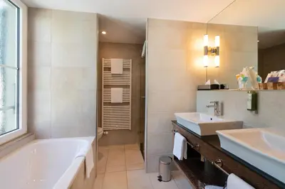 Ein Badezimmer in der Unterkunft Hotel Krebs Interlaken