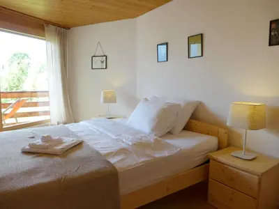 Ein Bett oder Betten in einem Zimmer der Unterkunft Apartment Gloria Süd by Interhome