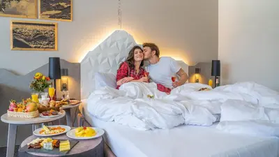 Ein Bett oder Betten in einem Zimmer der Unterkunft Sunstar Hotel & SPA Grindelwald