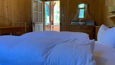 Ein Bett oder Betten in einem Zimmer der Unterkunft Berghaus Iffigenalp