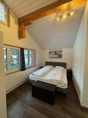 Ein Bett oder Betten in einem Zimmer der Unterkunft Comfortable chalet close to ski slopes