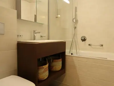 Ein Badezimmer in der Unterkunft Apartment Dents Rousses B4 by Interhome