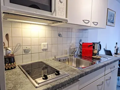 Küche/Küchenzeile in der Unterkunft Apartment Chalet am Reeti by Interhome