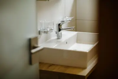 Ein Badezimmer in der Unterkunft Hotel PINTE