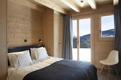 Ein Bett oder Betten in einem Zimmer der Unterkunft Bishorn COSY chalet 4 personnes