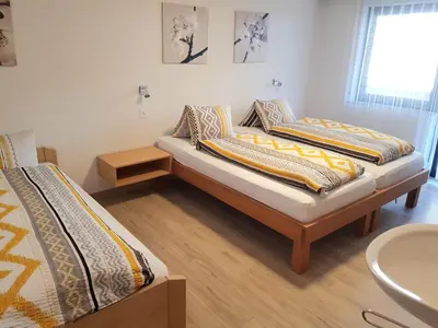 Ein Bett oder Betten in einem Zimmer der Unterkunft Ferienhaus Adonis