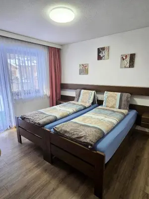 Ein Bett oder Betten in einem Zimmer der Unterkunft Ferienhaus Adonis