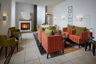 Ein Sitzbereich in der Unterkunft Hotel Bristol Relais du Silence Superior