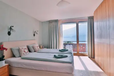 Ein Bett oder Betten in einem Zimmer der Unterkunft Seehaus Lake View 3-Bedroom Apartment