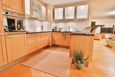 Küche/Küchenzeile in der Unterkunft Seehaus Lake View 3-Bedroom Apartment