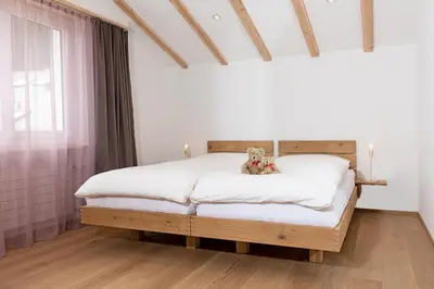 Ein Bett oder Betten in einem Zimmer der Unterkunft Mountain Apartments Zermatt Nr 10