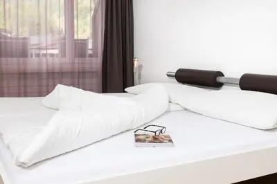 Ein Bett oder Betten in einem Zimmer der Unterkunft Mountain Apartments Zermatt Nr 10
